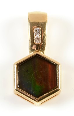 Lot 123 - Ammolite and diamond pendant