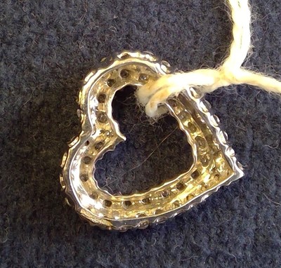 Lot 136 - Diamond set heart shaped pendant