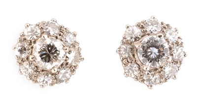 Lot 186 - A pair of diamond cluster earrings