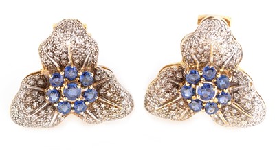 Lot 193 - A pair of leaf pattern sapphire and diamond earrings