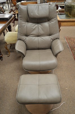 Lot 525 - A 20th Century Zedere leather recliner and stool