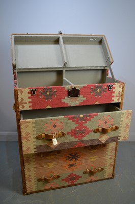 Lot 388 - A Kelim covered chest of drawers by Andrew Martin