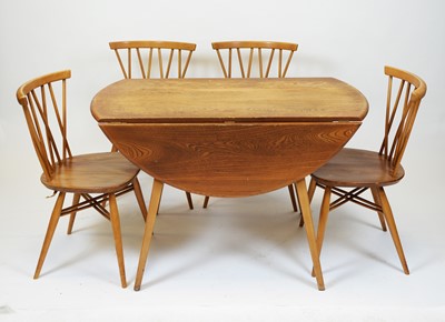 Lot 113 - Ercol - model 384 elm drop leaf dining table and four 'Shalstone' oak dining chairs
