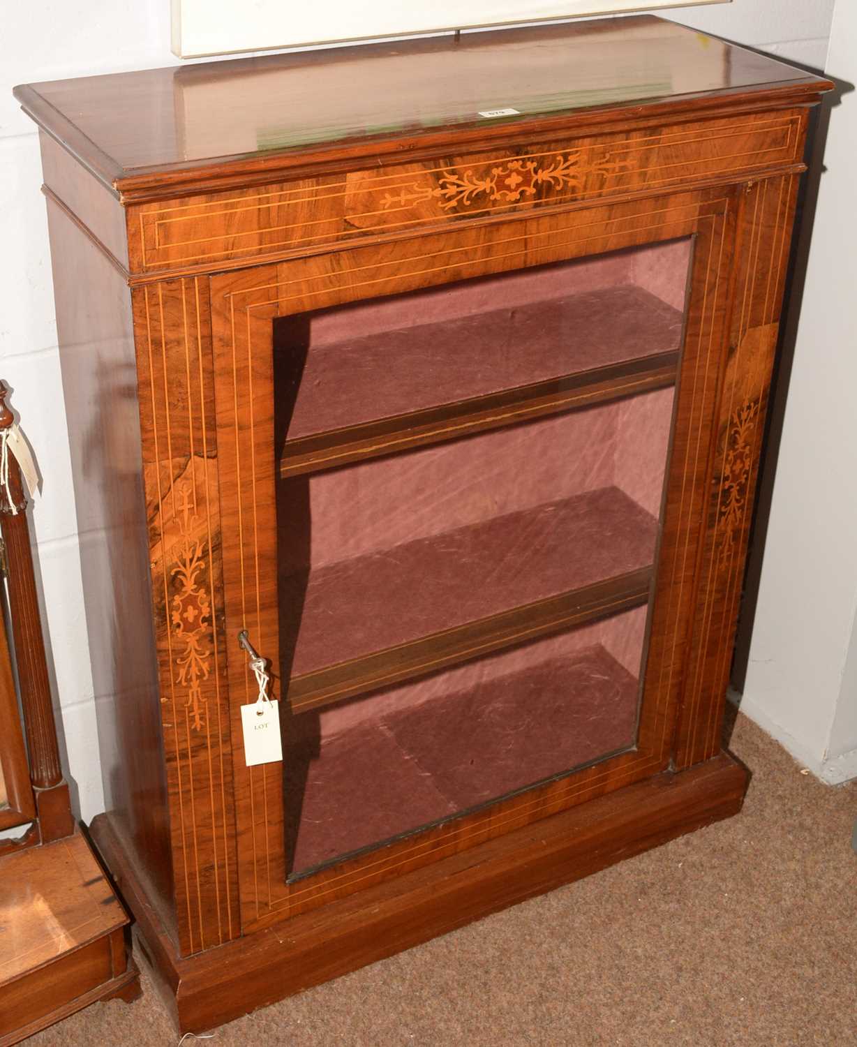 Lot 679 - Victorian walnut and inlaid pier cabinet