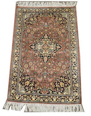 Lot 657 - Fine silk rug