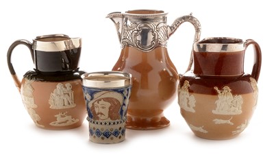 Lot 488 - Three Doulton jugs and a beaker.
