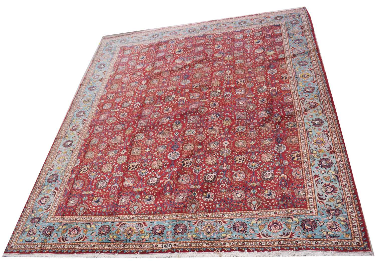 630A - A tabriz carpet