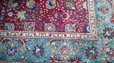 Lot 630 - A tabriz carpet