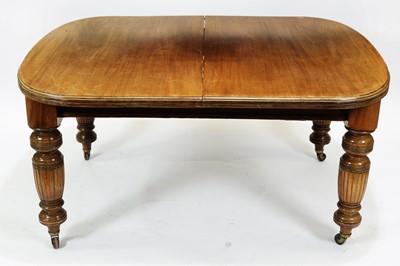 Lot 37 - Victorian wind out action dining table; and a chiffonier leaf holder