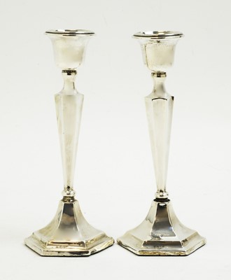 Lot 164 - A pair of George V silver candlesticks, by James Deakin & Sons