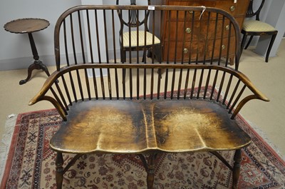 Lot 619 - A Windsor style two-seater settee.