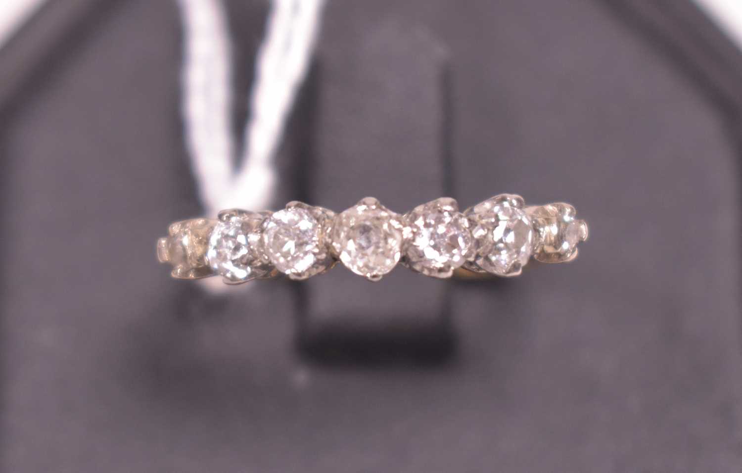Lot 9 - A seven stone diamond ring