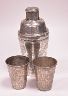 Lot 65 - A Persian silver cocktail shaker and two cups