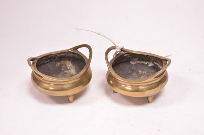 Lot 79 - A pair of small Chinese bronze censers