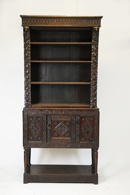 Lot 836 - Victorian carved oak bookcase on stand