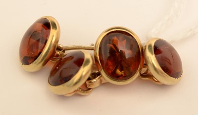 Lot 160 - A pair of red stone cufflinks