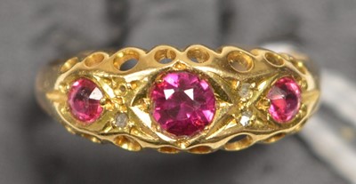 Lot 27 - A ruby and diamond ring