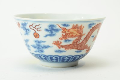 Lot 573 - Chinese blue and iron-red dragon bowl