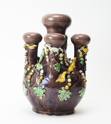 Lot 583 - Chinese aubergine glazed five stem bulb vase