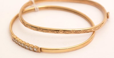 Lot 57 - Two gold bangles