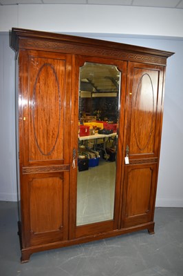 Lot 474 - Early 20th Century mahogany three door wardrobe