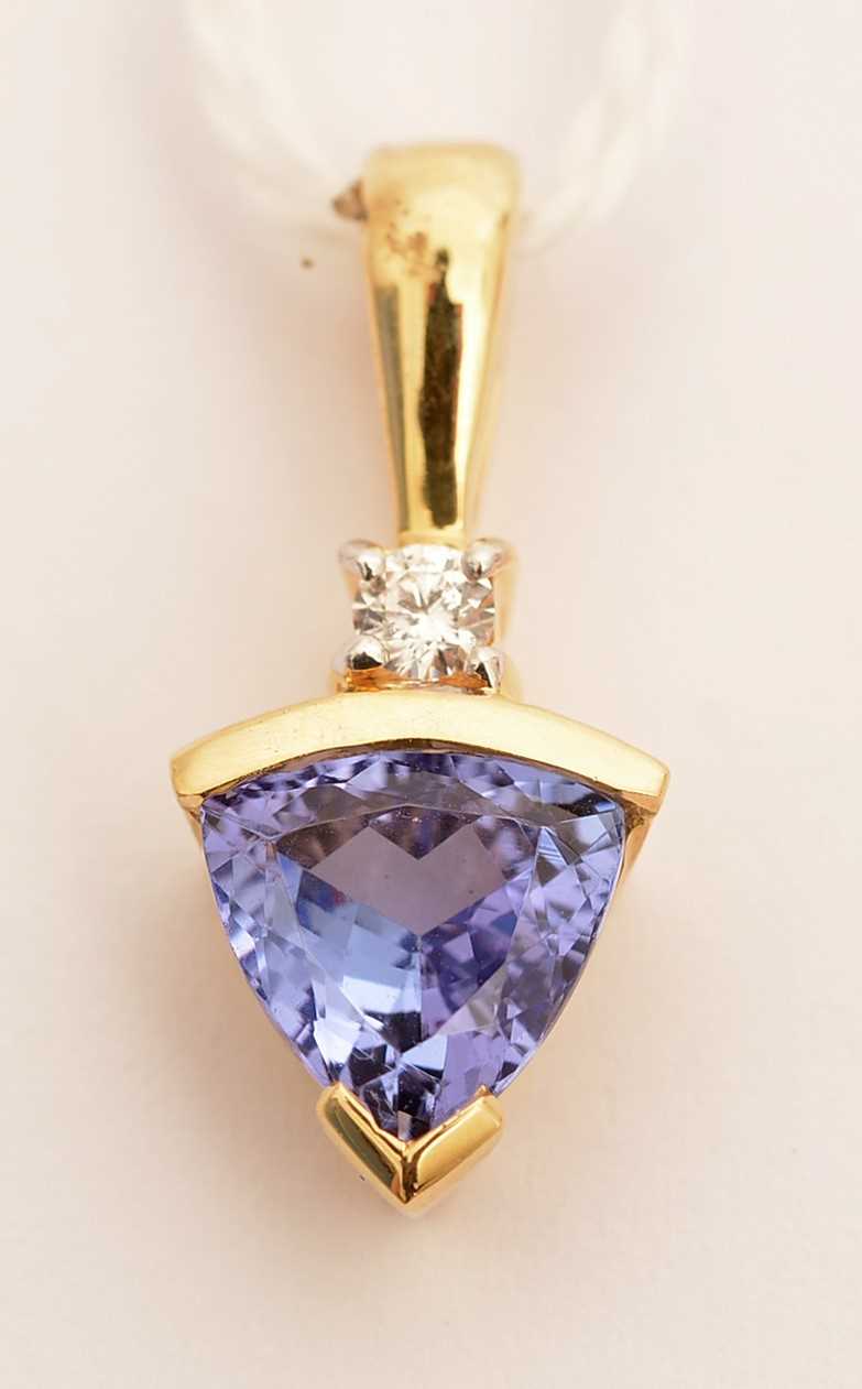 Lot 97 - A tanzanite and diamond pendant