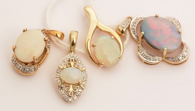 Lot 112 - Four opal pendants