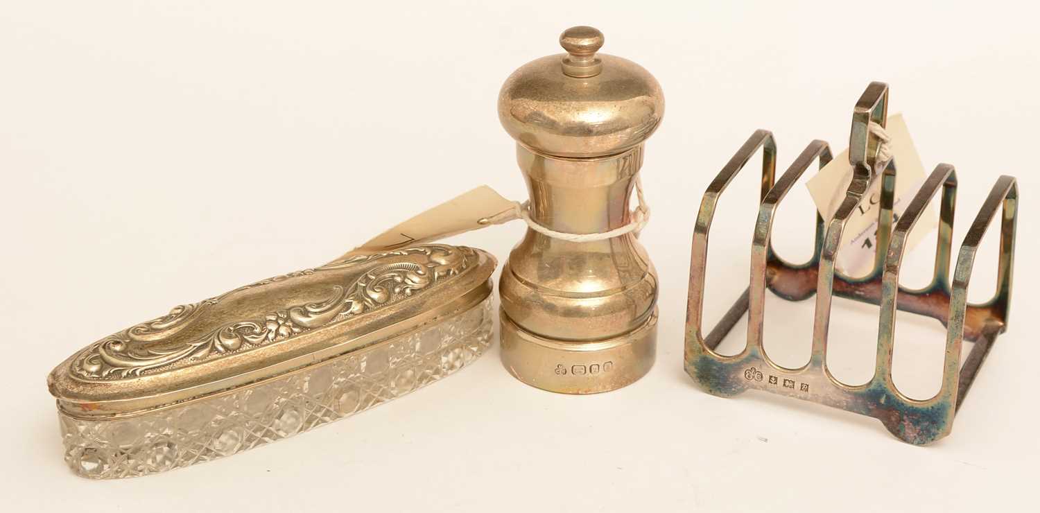 Lot 184 - Silver pepper grinder, toast rack and pin pot
