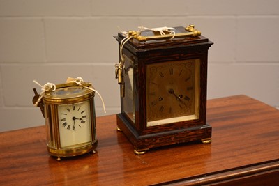 Lot 426 - A mantel clock; and a carriage clock.