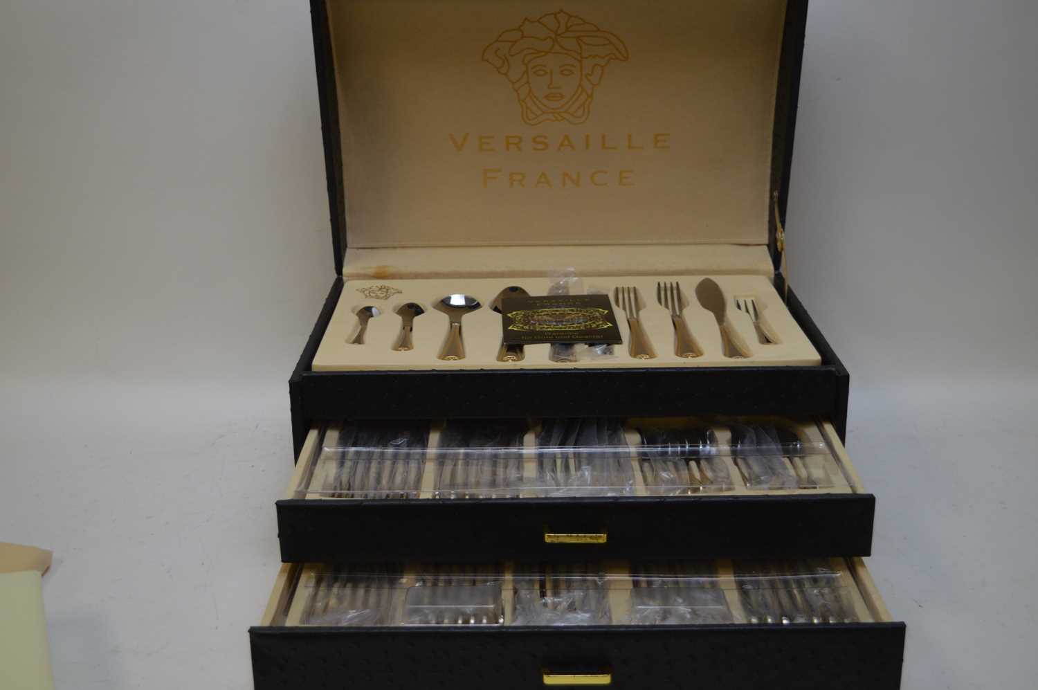 Lot 350 - Versaille france stainless steel and gold plated cutlery set.