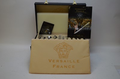 Lot 350 - Versaille france stainless steel and gold plated cutlery set.