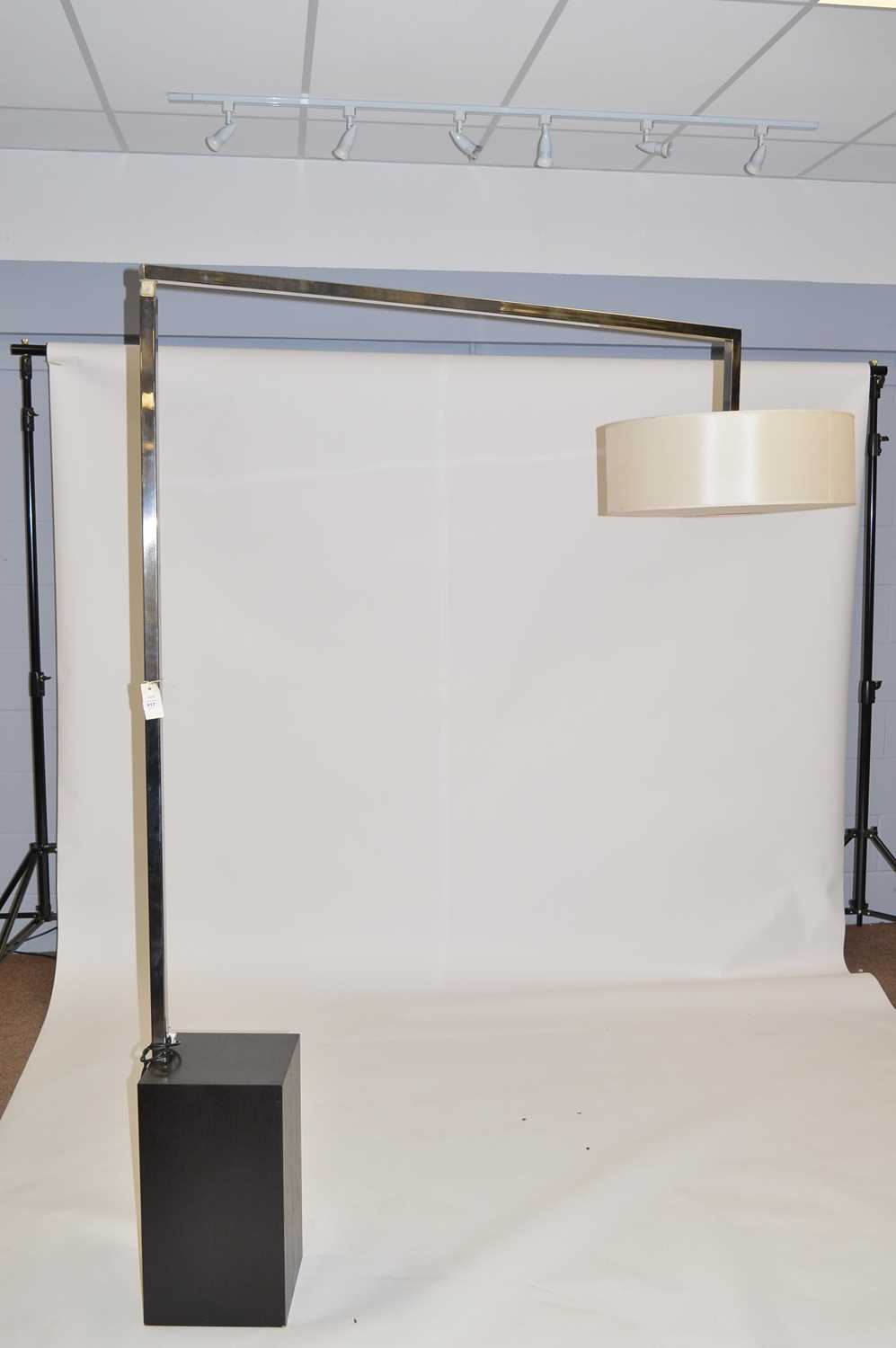 Lot 517 - Modenature Move Inox floor lamp supplied for an early project by Fiona Barratt Interiors.
