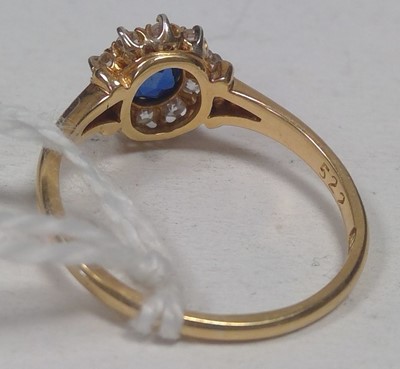 Lot 6 - Sapphire and diamond cluster ring
