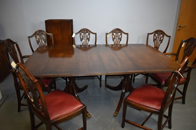 Lot 465 - Mid-20th Century mahogany dining room suite