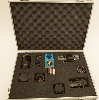 Lot 928 - A Praktica VLC3 camera and lenses.
