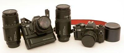 Lot 930 - Two Praktica cameras and lenses.