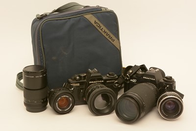 Lot 931 - Two Praktica cameras and lenses.