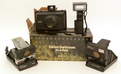 Lot 933 - Polaroid photography equipment.