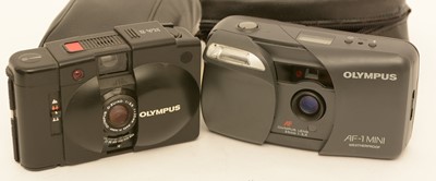 Lot 913 - Two Olympus cameras.
