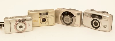 Lot 921 - Four compact cameras.