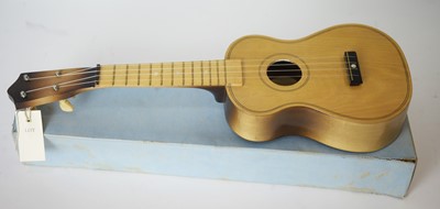 Lot 731 - Melody Junior Banjolele and two ukuleles