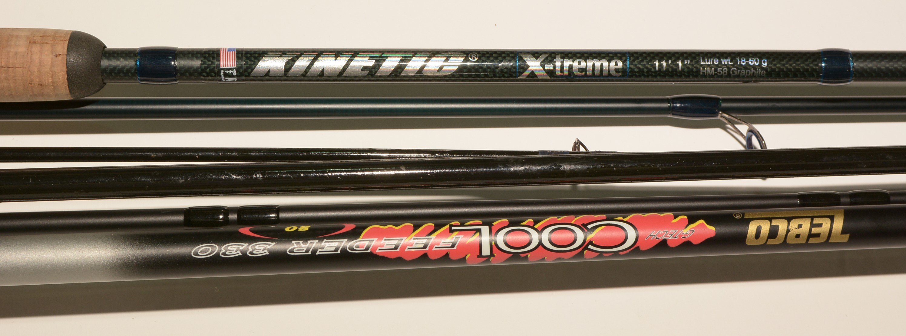 Lot 693 - Three modern graphite fishing rods.