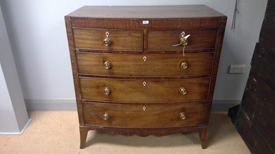 Lot 561 - Georgian mahogany chest of drawers.