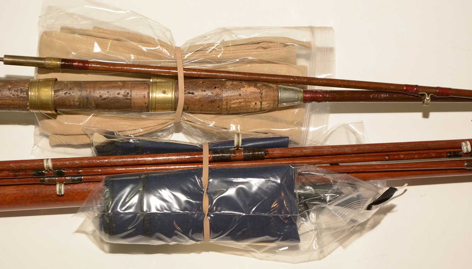 Lot 707 - Two vintage Greenheart rods.