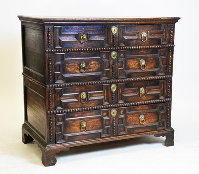 Lot 833 - 17th Century oak geometric fronted split chest