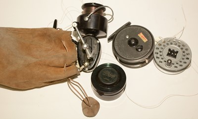 Lot 724 - Two fishing reels and spare spools.