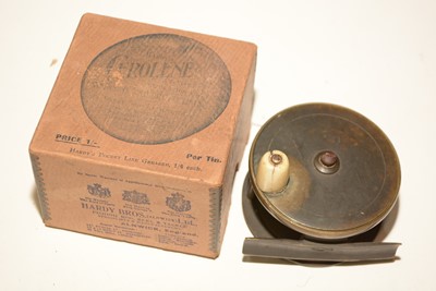 Lot 652 - All brass fishing reel and Hardy box.