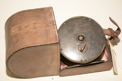 Lot 655 - 4 1/4in. fishing reel with box leather case.