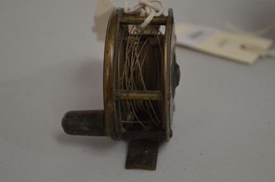 Lot 702 - Heatons reel; and two unnamed fishing reels.
