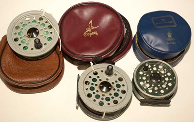 Lot 759 - Three reels, a spool and pouches.